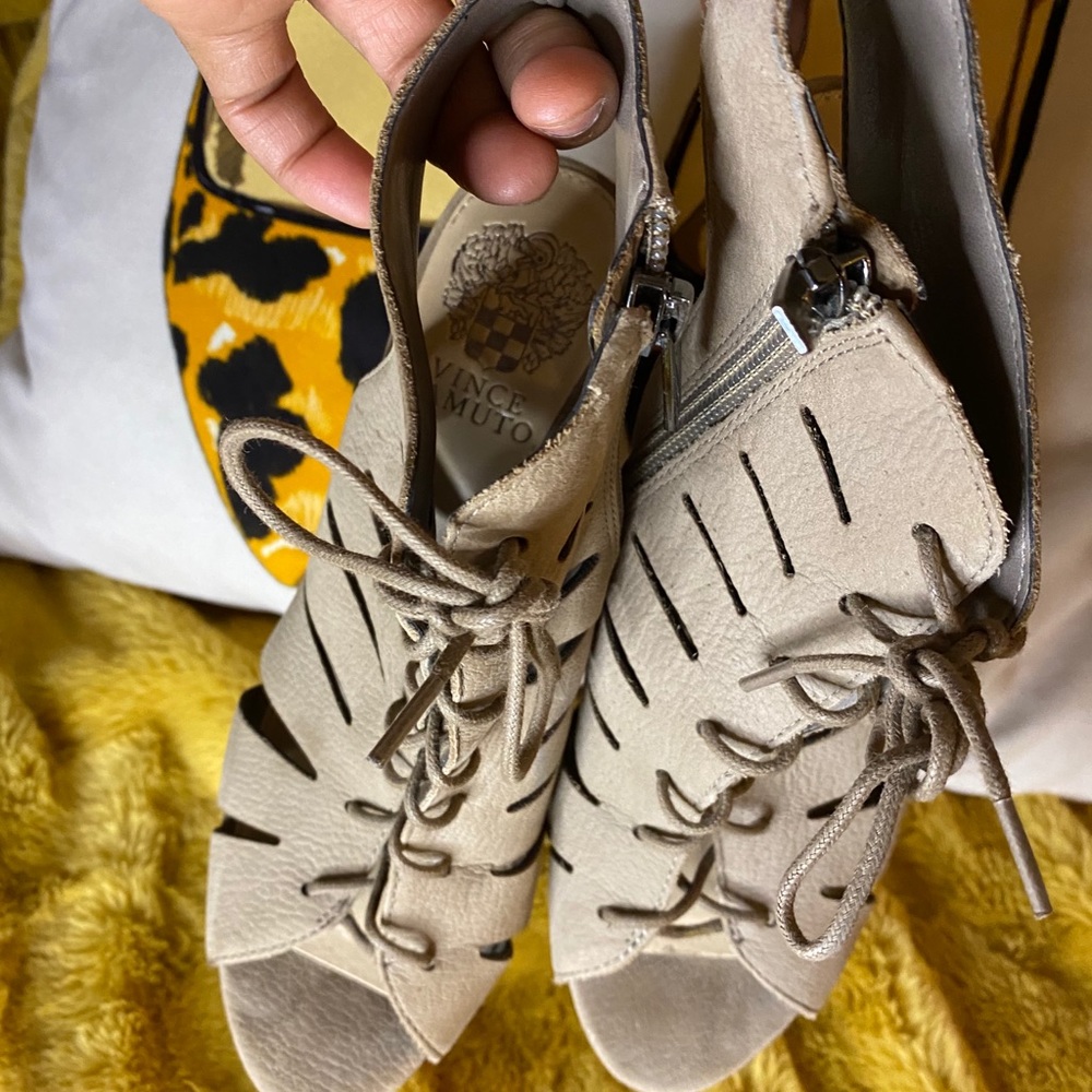 Taupe lace up booties by Vince Camuto